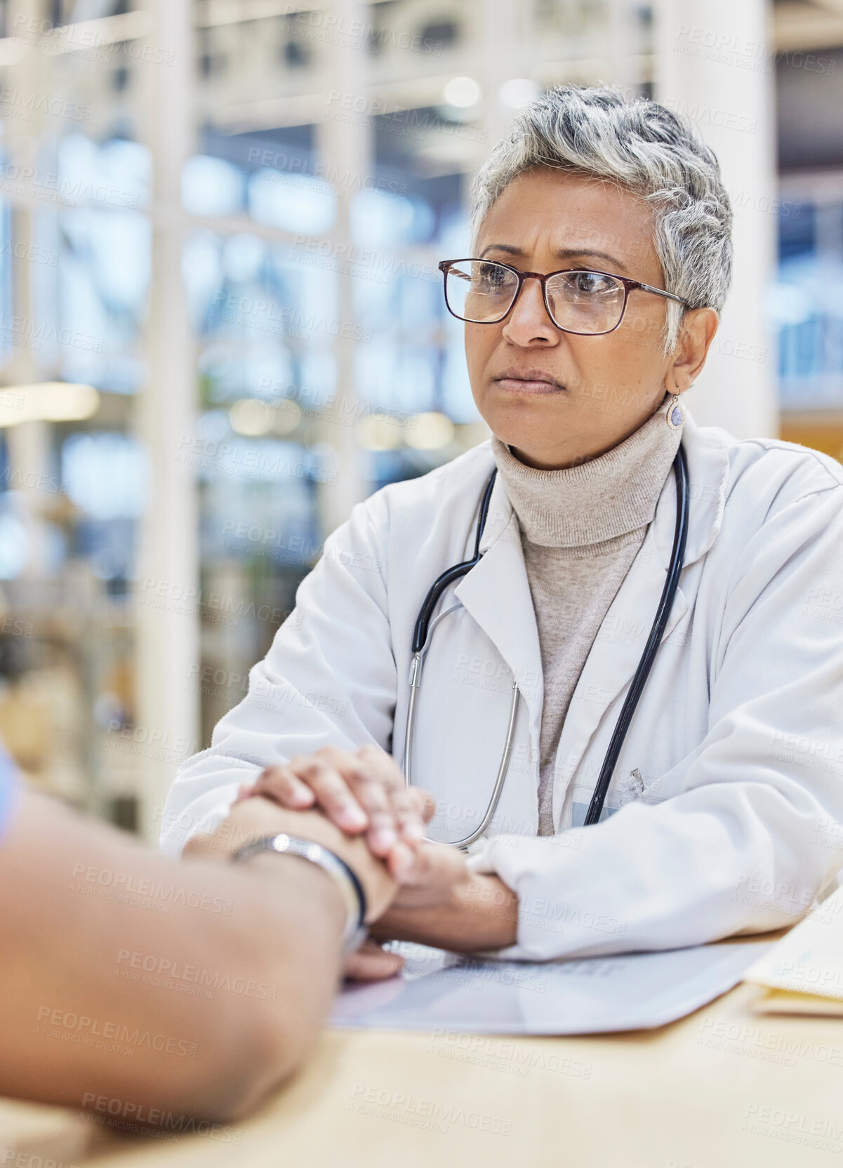 Buy stock photo Senior doctor with patient, holding hands and support, woman with bad news and diagnosis, cancer and health crisis. Female physician, medical problem and consultation with help and healthcare