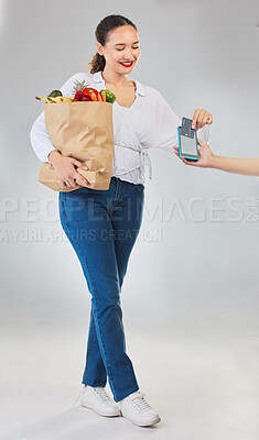 Buy stock photo Card machine, grocery shopping and woman for business, POS and shop payment, fintech or digital finance. Groceries, credit and cashier hands, people and food bag at point of sale on studio background