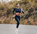 Mountain, running and woman for fitness, exercise and speed training, outdoor challenge and focus on road. Fast professional runner, athlete or african sports person for cardio workout or marathon