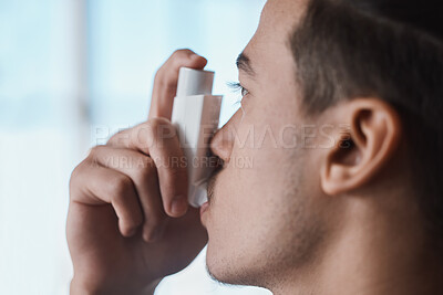 Buy stock photo Asthma pump, breathe and man with healthcare, medicine and wellness spray for health. Breathing, inhaler and lung relief with a male person holding medication for medical problem support and care