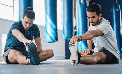 Buy stock photo Men, gym and legs stretching of friends before training, fitness and workout in health club. Warmup, athlete and man ready to start sport exercise together on the floor with personal trainer class