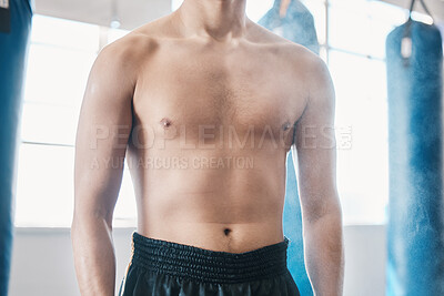 Buy stock photo Sports, boxing and abdomen of man with muscle in gym for training, workout and exercise for mma. Fitness, body builder and stomach of male athlete ready for boxer competition, practice and cardio