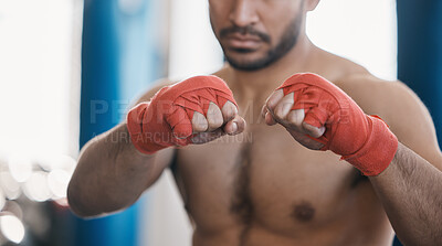 Buy stock photo Sports, boxing and hands of man punch in gym for training, workout and exercise for mma fight. Fitness, body builder and closeup of male athlete ready for boxer competition, practice and performance