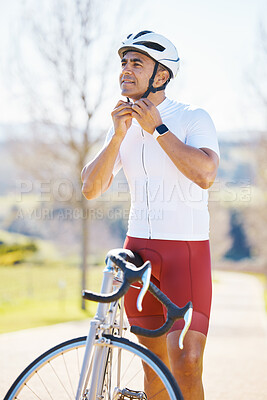Buy stock photo Bicycle, helmet and man cycling in a competition, fitness training or marathon or sports adventure with blue sky. Gear, athlete and safety in outdoor cycle, bike ride or exercise in nature or park