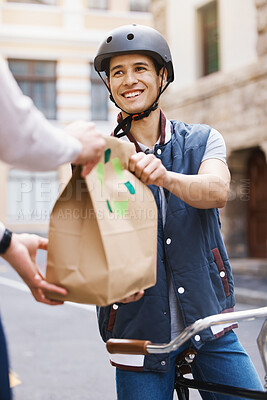 Buy stock photo Man, delivery bicycle and smile with bag, order or e commerce for food, product or sustainable transport. Young guy, bike and cbd street for customer experience, chat or eco friendly at logistics job