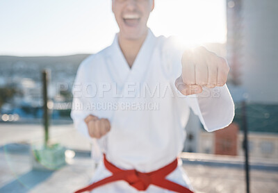Buy stock photo Karate, fitness and fight with a sports man in gi, training in the city on a blurred background. Exercise, discipline or power with a male athlete during a self defense workout for health closeup