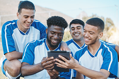 Group of diverse friends playing game on mobile phone Stock Photo