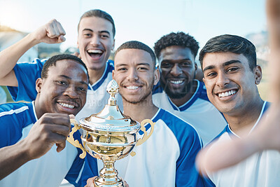 Buy stock photo Sports group, soccer trophy and selfie of team on field for game award or prize outdoor. Football player, club and diversity champion men portrait for sport competition win, success and achievement