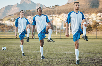 Buy stock photo Soccer, sports and team stretching legs on a field for fitness, exercise and training outdoor. Football ball, pitch and club of athlete men together for sport competition, diversity or muscle warm up