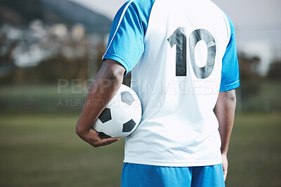 Buy stock photo Sports, soccer ball and man with uniform number on a field for exercise, fitness and training outdoor. Football club, pitch and event or game with athlete person and mockup for sport competition