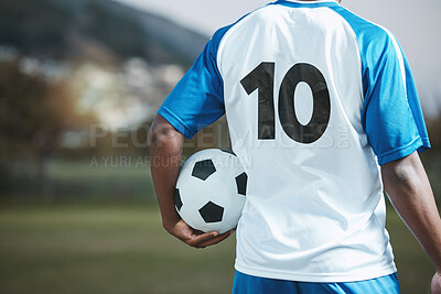 Buy stock photo Soccer ball, sports and man with uniform number on a field for exercise, fitness and training outdoor. Football club, pitch and event or game with athlete person and mockup for sport competition