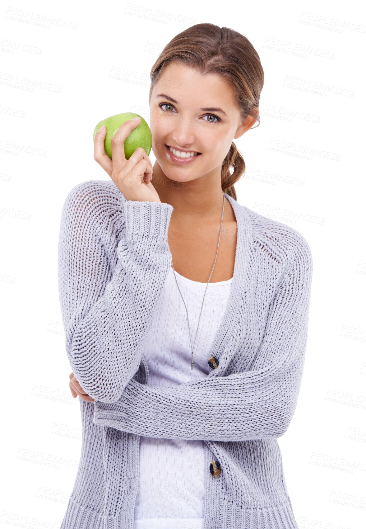 Buy stock photo Portrait, happy and apple with a model woman isolated on a transparent background for health or nutrition. Food, smile or diet with an attractive young female person holding a green fruit on PNG