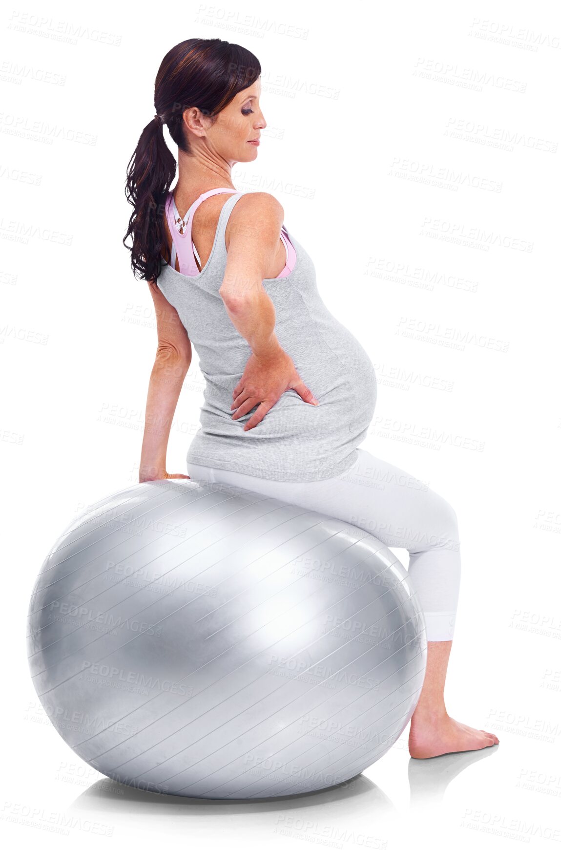 Buy stock photo Back pain, fitness and maternal with a pregnant woman isolated on a transparent background for health. Accident, emergency and anatomy with an injured young mother training on an exercise ball on PNG