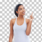 A young woman in gym clothes pointing upwards isolated on png background