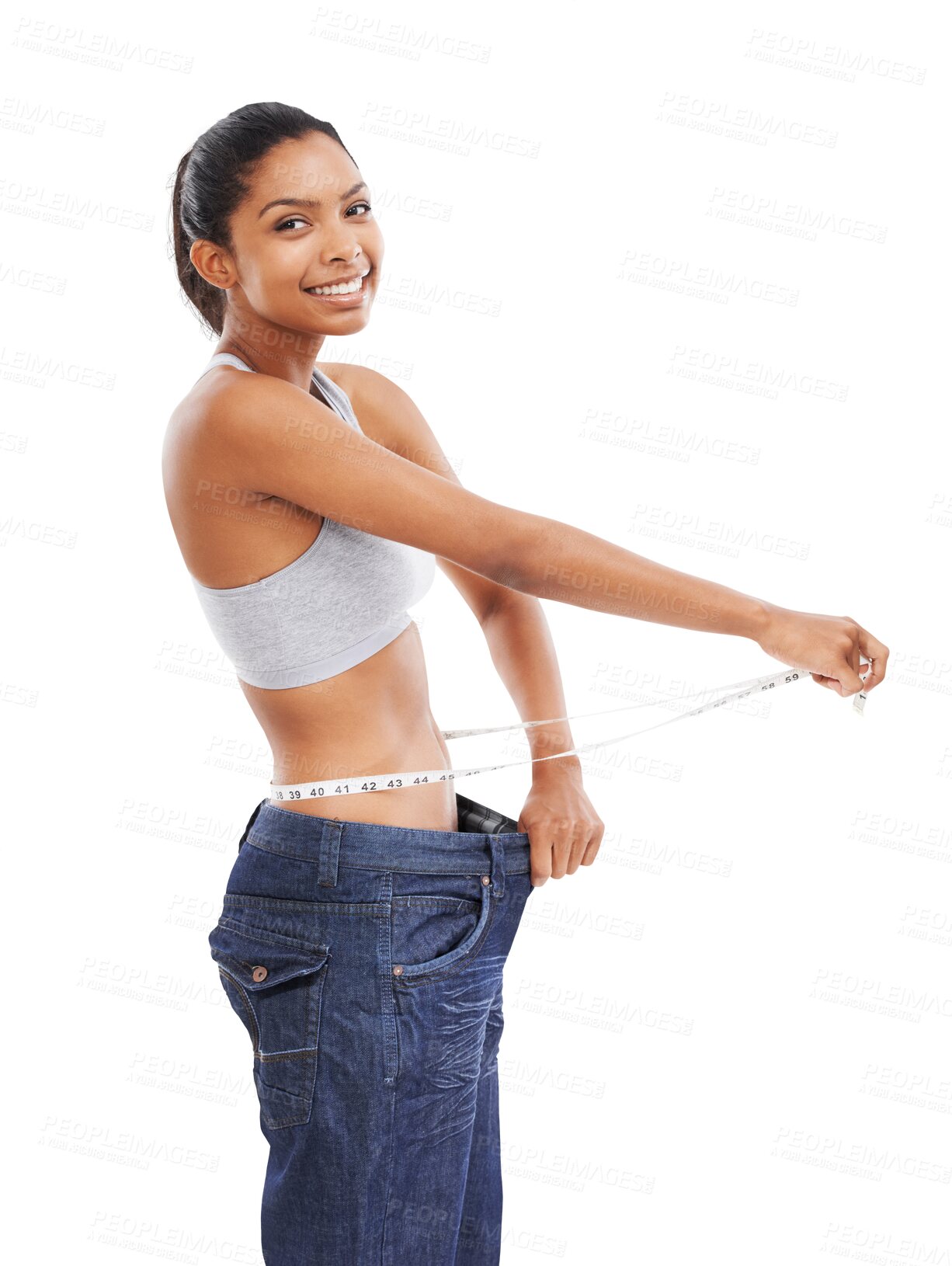 Buy stock photo Happy woman, portrait and baggy jeans with tape measure on isolated, transparent and png background. Smile, measuring and female face with lose weight, exercise or healthy diet, results or motivation