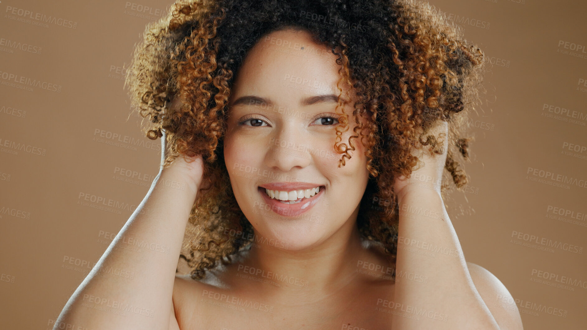 Buy stock photo Portrait of happy woman, model or natural beauty cosmetics for wellness in studio with smile. Skin glow, transformation or confident biracial female person with skincare or pride on brown background