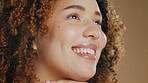 Black woman laugh, face closeup and cosmetic wellness of a model in a studio with happiness. Skin glow, beauty cosmetics and young African person with a smile from skincare, makeup and dermatology