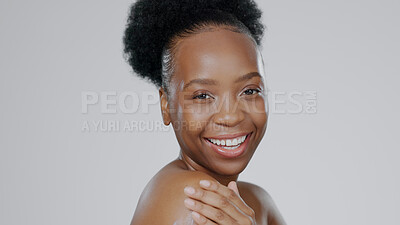 Buy stock photo Portrait, beauty and smile with a happy black woman in studio on a gray background for natural wellness. Skincare, aesthetic or cosmetics with a happy young model closeup for antiaging face treatment