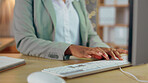 Woman, hands and typing on computer at night for research, planning or project deadline at the office desk. Hand of female business employee working late on desktop PC keyboard for online search