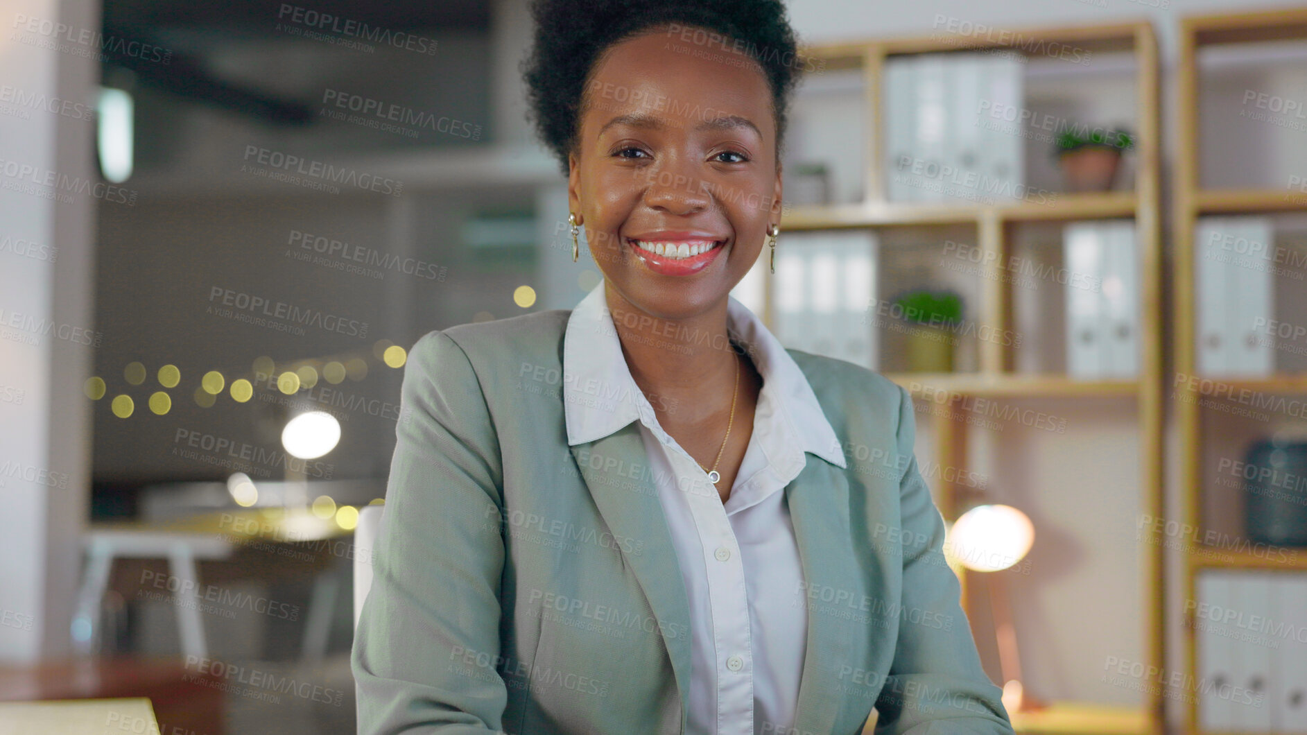 Buy stock photo Portrait, smile and business black woman manager in an office at night for corporate or professional work. Management, leadership and evening with a happy young CEO or boss in a suit at the workplace
