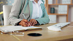 Woman, hands and writing schedule in notebook at night for planning, reminder or information at office. Hand of female business employee working late taking notes in book for project plan or finance