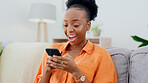 Phone, happy and black woman on a sofa typing a text message while relaxing in the living room. Happiness, communication and African female networking on social media or the internet with a cellphone
