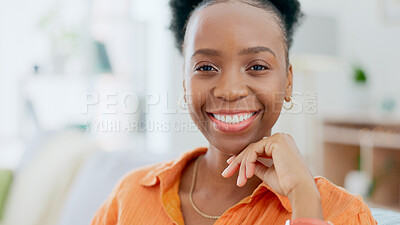 Buy stock photo Portrait, freedom and smile with a black woman on a sofa in the living room of her home during the weekend. Face, relax and happy with a confident young person alone in the lounge of her apartment