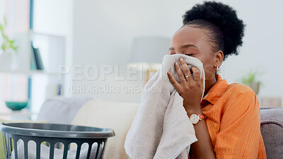 Buy stock photo Clean, smell and black woman with laundry in home or basket with clothes, linen or maid spring cleaning in apartment. Fresh, washing and clothing with detergent or cleaner aroma on fabric in house