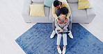 Couple, top view and living room with laptop, typing and relax on sofa, floor and social media. Black man, woman and technology for bonding, communication or work from home with computer in lounge