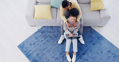 Buy stock photo Top view, home and African couple with a laptop, relax and connection with internet, online reading and network. Apartment, man or woman with a pc, communication or bonding with website info or email