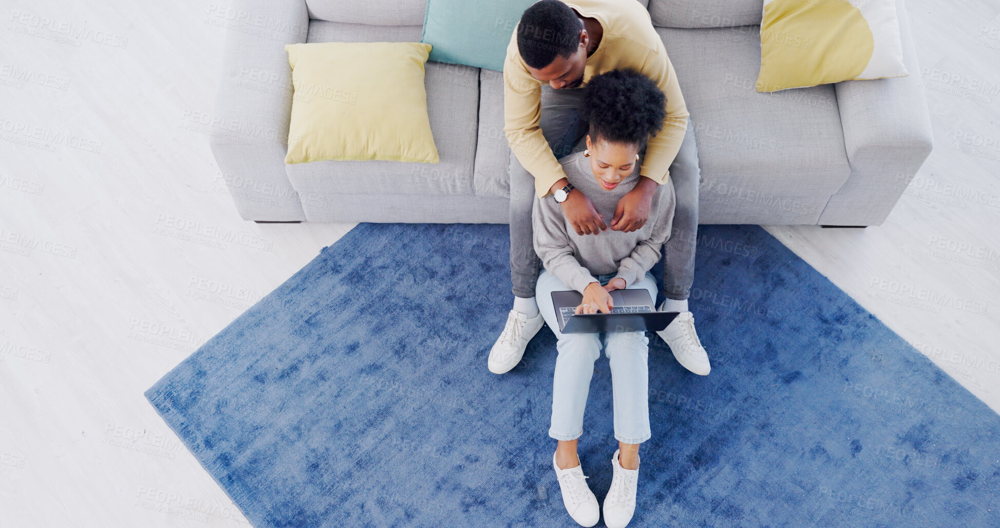 Buy stock photo Top view, home and African couple with a laptop, relax and connection with internet, online reading and network. Apartment, man or woman with a pc, communication or bonding with website info or email