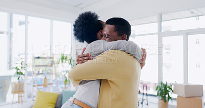 Buy stock photo Black couple, hug and embrace with love, happy and living room in home, bonding and joy. Quality time, together and romantic with man, woman and intimate relationship with romance, reunion and smile