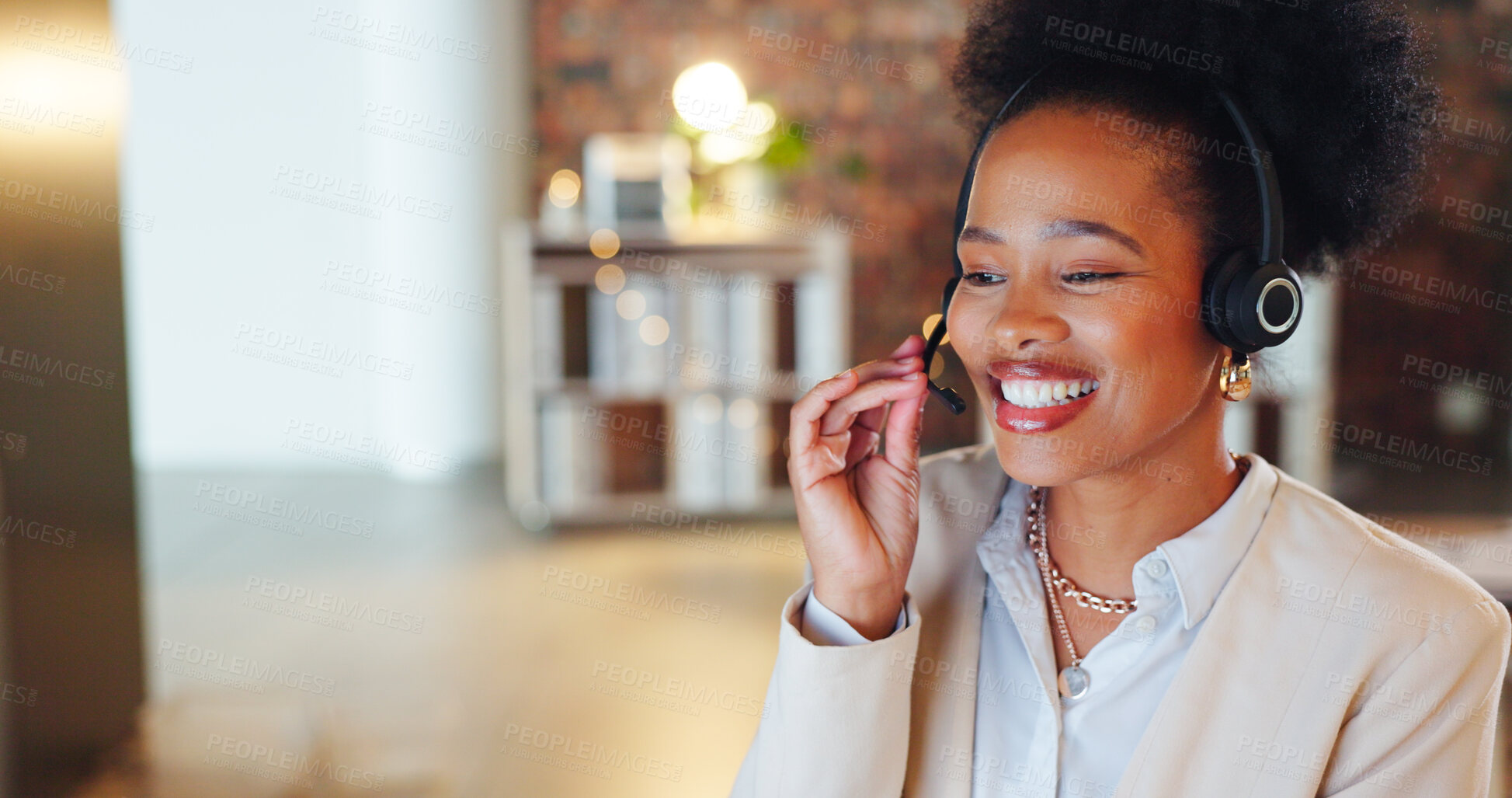 Buy stock photo African woman, call center and talk in night, office and smile for telemarketing, voip mic and contact us. Consultant, crm and tech support agent with customer care, thinking and service at help desk