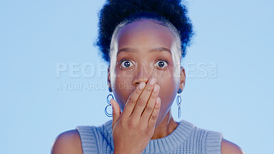 Buy stock photo Woman, shock and hand on mouth for gossip, news and drama in studio by blue background. Black model, surprise and emoji for secret, alarm and disaster in information, wtf and anxiety in mockup