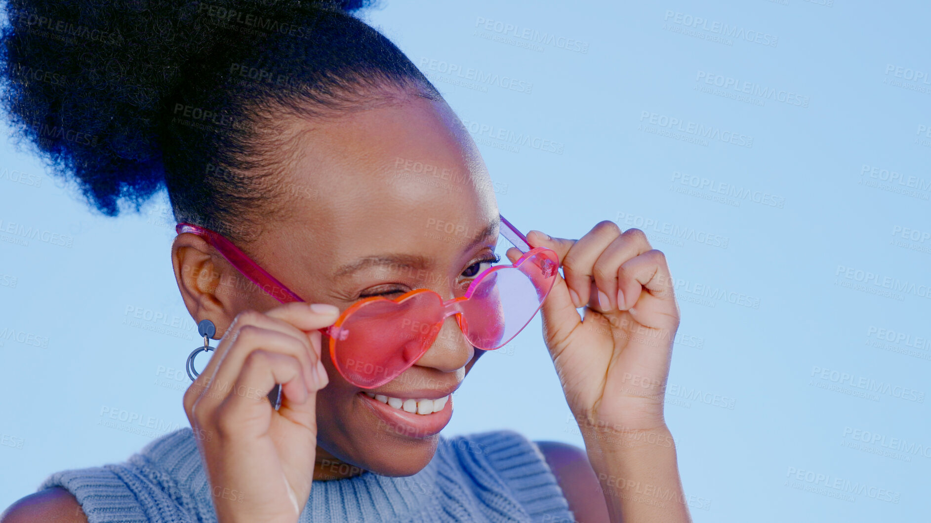 Buy stock photo Fun, sunglasses and smile, black woman in studio with cool, trendy summer fashion and creative mockup. Happiness, luxury eyewear and excited model with designer frame on blue background for eye care.