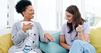 Friends, women and wedding ring on sofa laughing in living room of home and discussion. Comic, engagement and funny smile of happy girls showing off commitment jewelry for love marriage on couch.