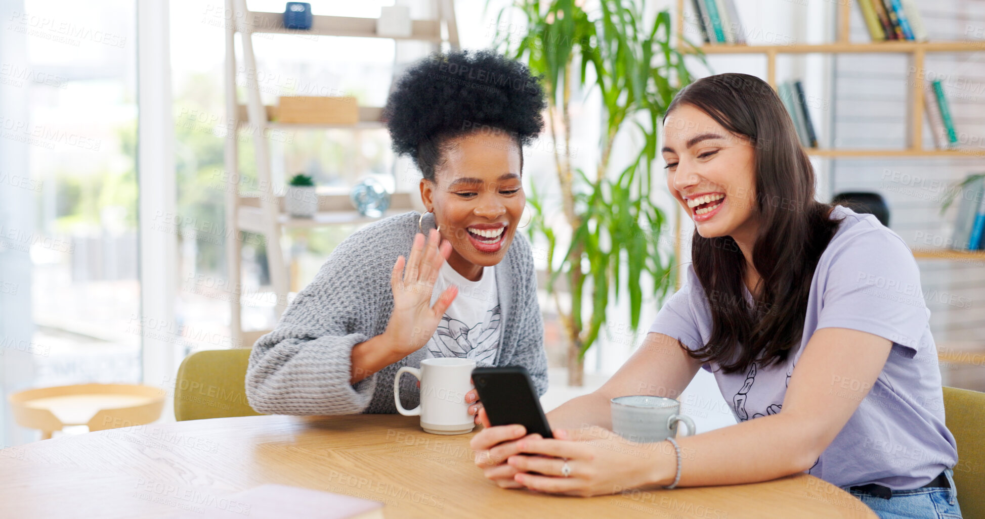 Buy stock photo Women friends, video call and phone in coffee shop, wave and excited for conversation, talk and contact. Girl, smartphone and smile together for communication, social media app and relax with tea cup