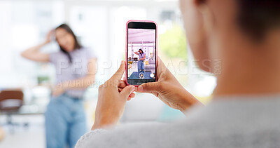 Buy stock photo Phone, woman and influencer recording video for social media, vlog or online post dancing at home. Hands, cellphone and female content creator live streaming and moving to music in living room.