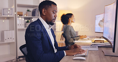 Buy stock photo Business, night and black man typing on computer in office working late for planning, proposal and project. Corporate, focus and male worker at desk for writing email, website research and report