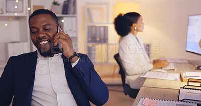 Buy stock photo Laugh, night and phone call with black man in office for consulting, networking and communication. Discussion, connection and hello with male in agency for commitment, positive and overtime