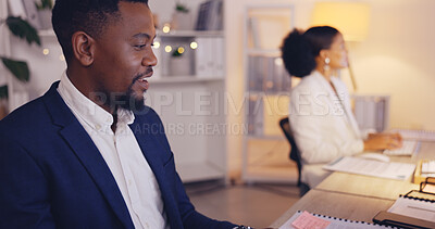 Buy stock photo Business, writing and black man with notebook by computer working late for planning, proposal and project. Corporate, focus and male worker at desk schedule, website research and online report notes