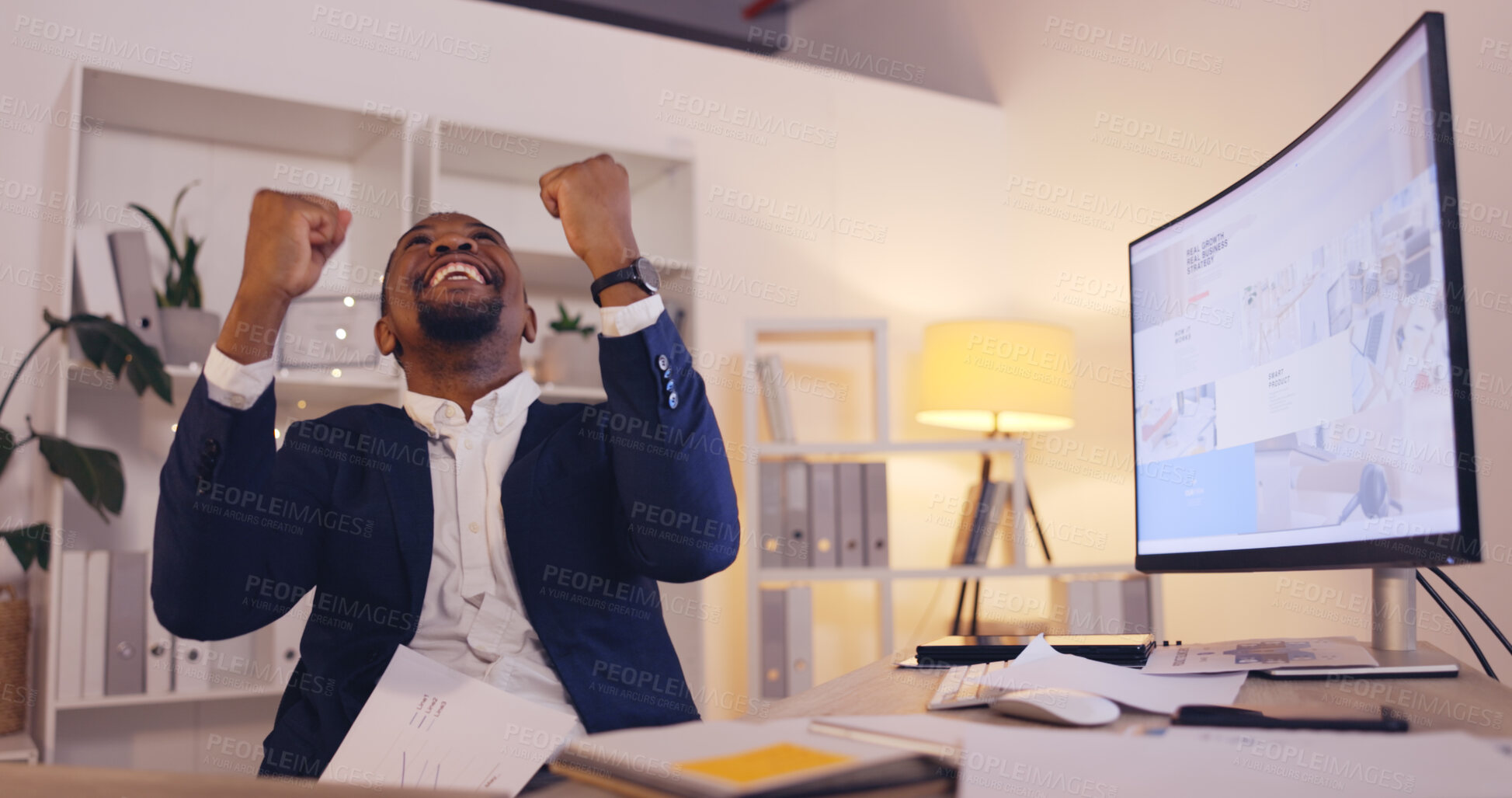 Buy stock photo Happy businessman, fist pump and celebration at night for success, winning or achievement at office. Black man smile working late for bonus, promotion or good news in victory or sale at workplace