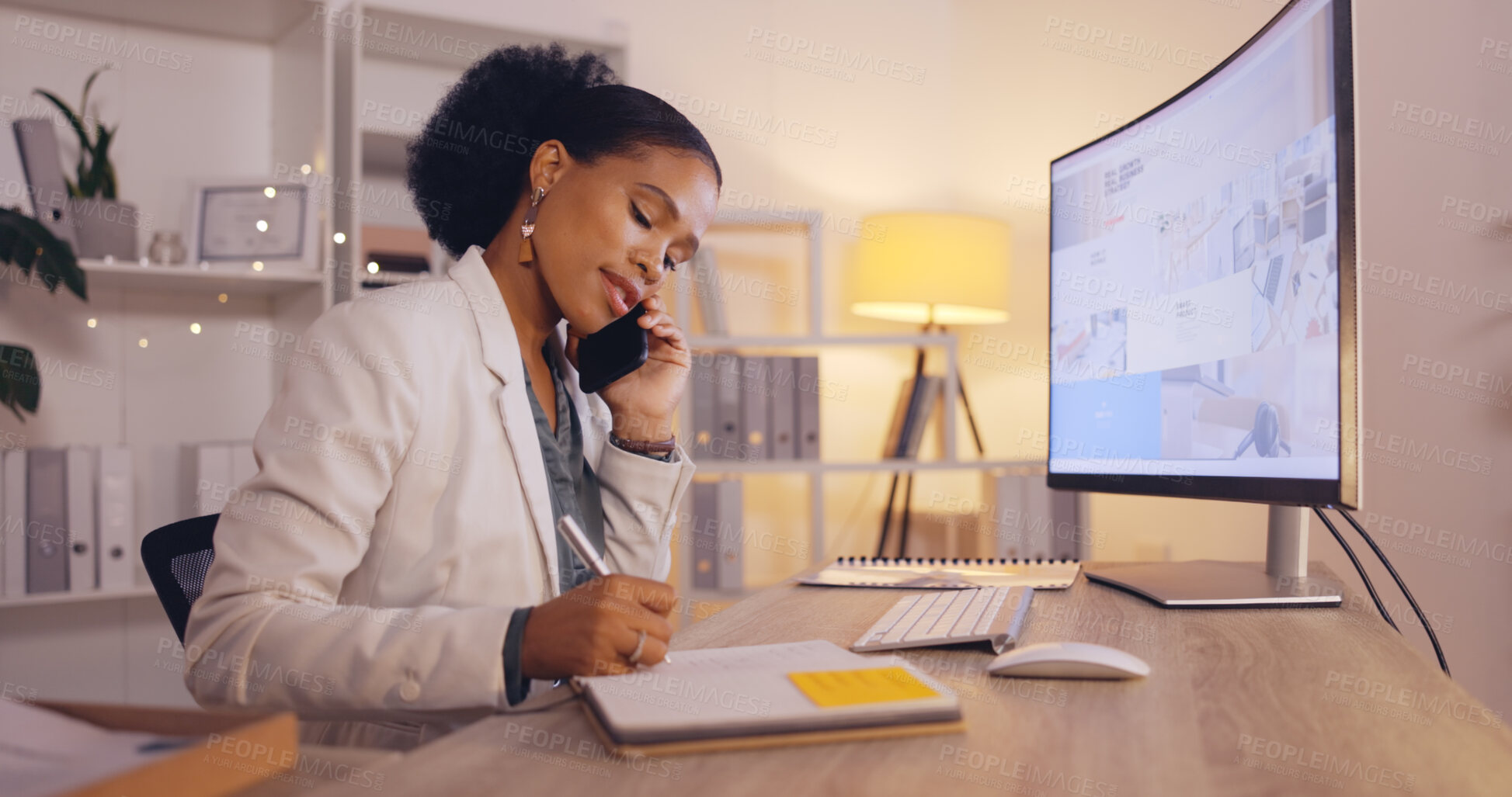 Buy stock photo Phone call, planning and business woman talking, helping or support for virtual client, writing notes and strategy at night. Professional worker or african person on cellphone discussion and notebook