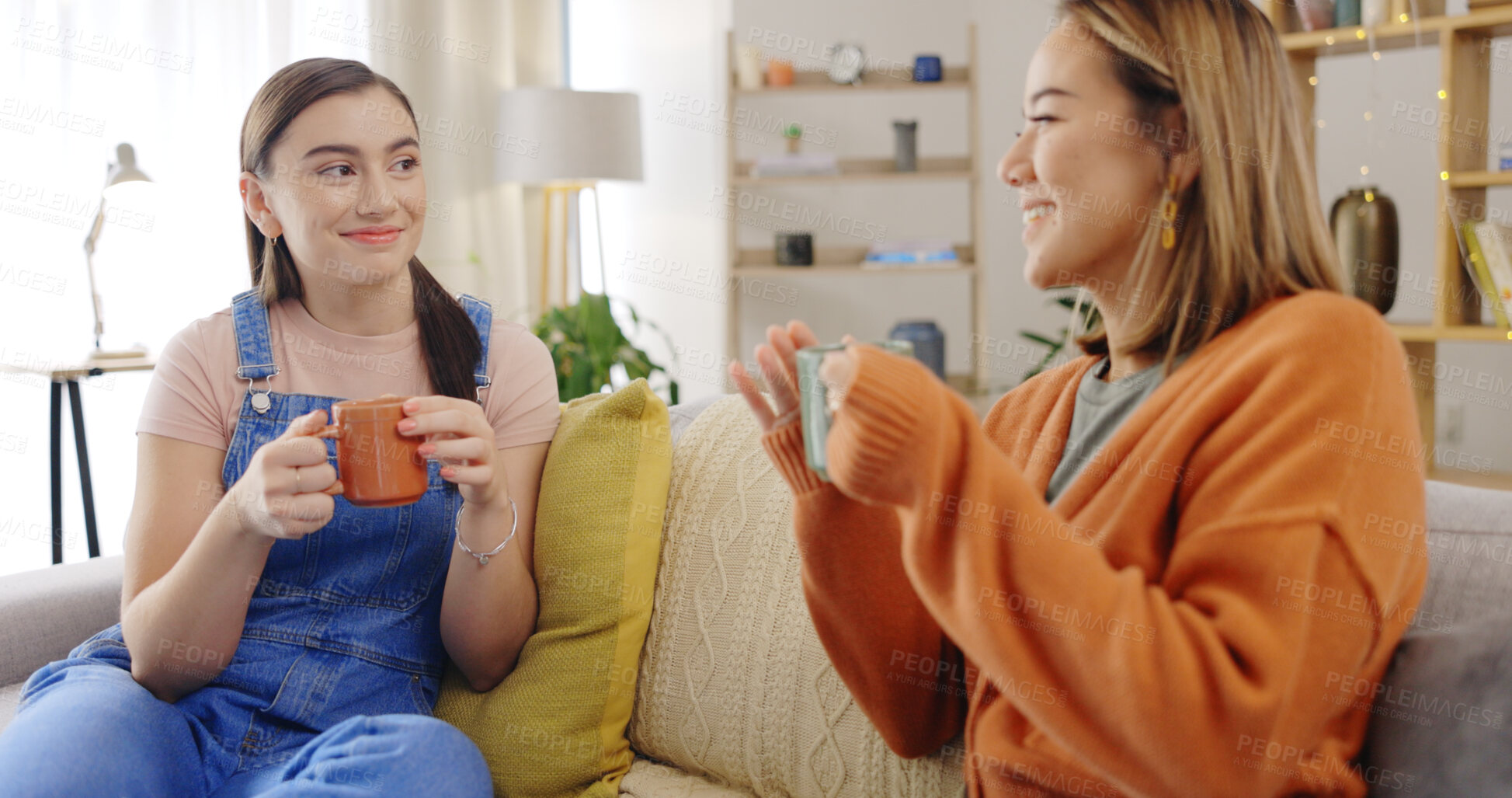 Buy stock photo Friends, conversation or women on sofa with tea bonding or talking in house living room to relax. Support, coffee drink or happy people on couch listening or speaking of gossip in discussion in home 