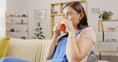 Buy stock photo Woman, coffee and relax on sofa for break, thinking or daydreaming in living room at home. Female person drinking latte, tea or beverage on calm holiday, morning or weekend on lounge couch at house