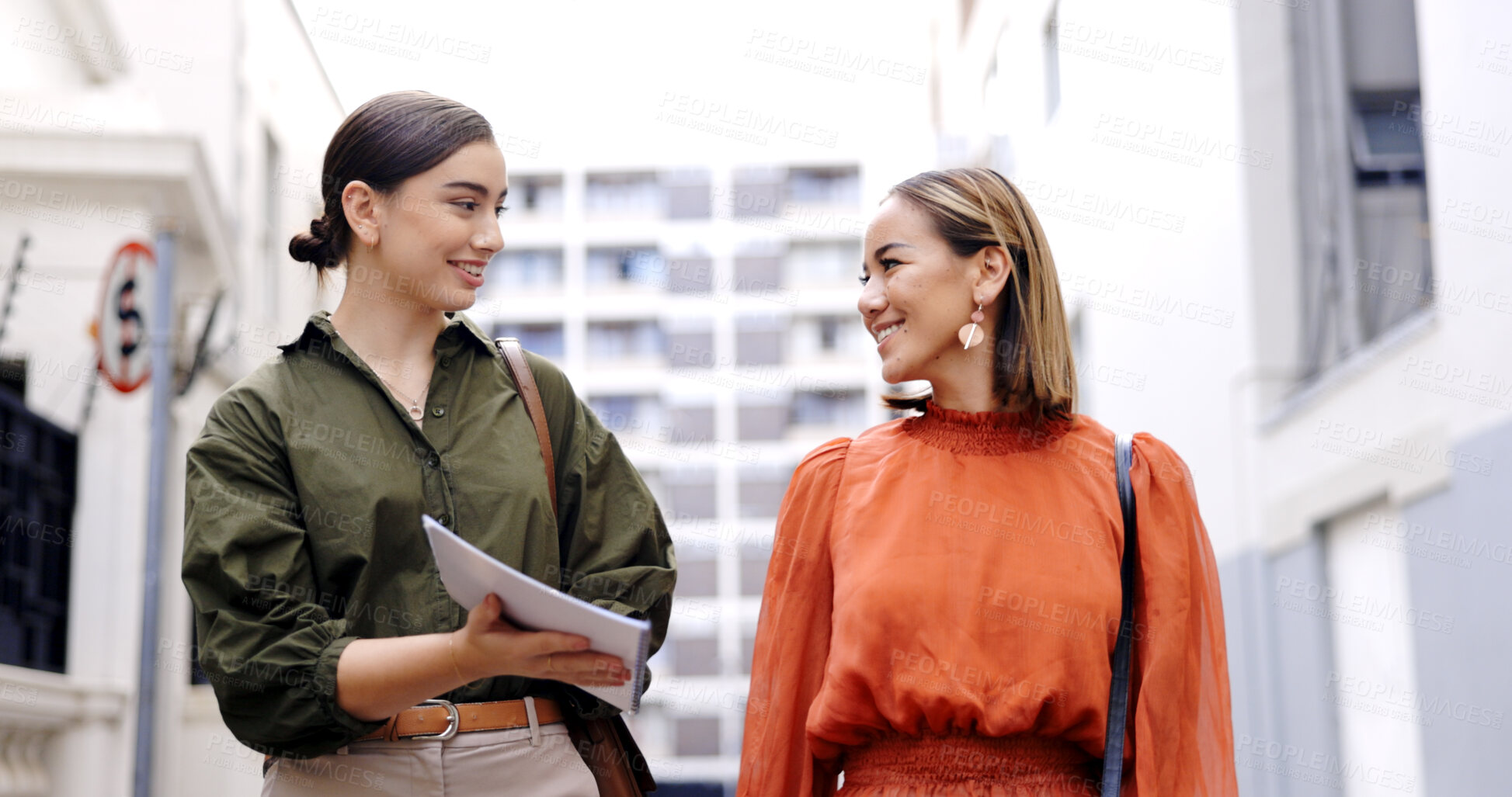 Buy stock photo City, women and employees walking, documents and discussion for ideas, planning and teamwork. Female coworkers, staff and friends with paperwork, smile and communication with collaboration research