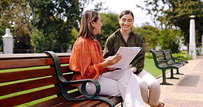 Lawyer, talking and woman outdoor with documents for business, advice or feedback on contract. Legal, paperwork and friends conversation in city with professional, communication and collaboration