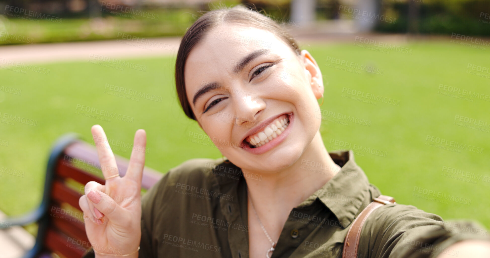 Buy stock photo Peace sign, selfie and portrait of happy woman at park outdoor, emoji gesture and smile. Photography, v hand and face of person in nature for social media picture, internet and influencer in garden