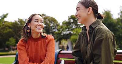 Buy stock photo Smile, friends and women at park bench, talking and communication outdoor. Conversation, relax and happy girls in nature together, listening to story or gossip, funny and laughing at comedy in garden