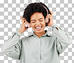 Music headphones, black woman and singing in studio isolated on a white background. Singer, radio and happiness of person listening, streaming or enjoying audio track, sound album or podcast song.